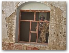 In 2008 Chris ran a half marathon around a helicopter landing site in Musa Qala, Afghanistan raising over &pound;5,000 for Help for Heroes  &raquo; Click to zoom ->